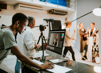 Photography studio employees working on a photoshoot