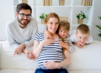Photo of a family during a maternity photoshoot