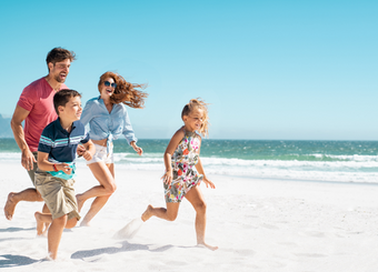 Family having fun at the beach