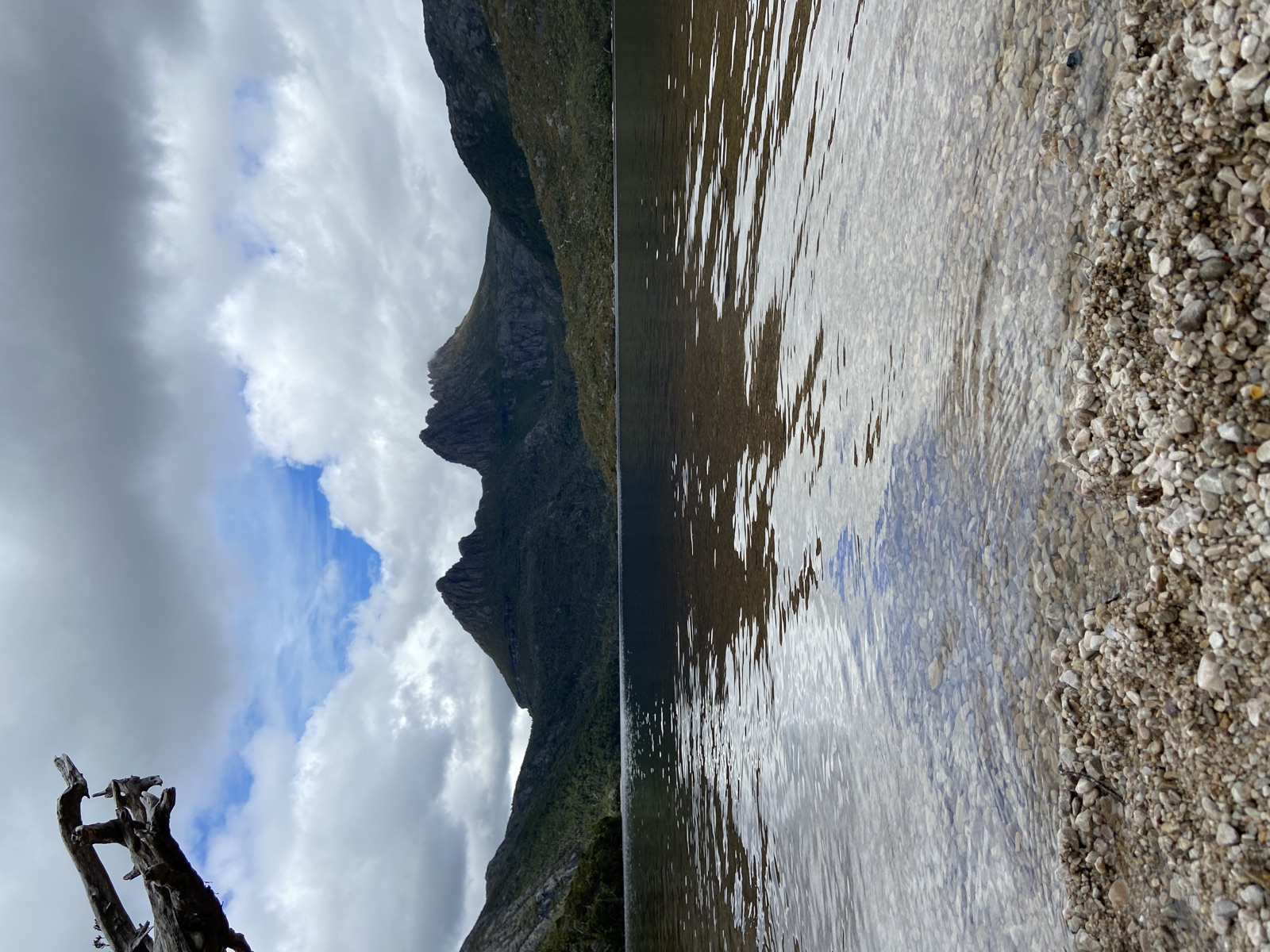 Cradle Mountain reflected in the still waters of Dove Lake, Tasmania, at dawn
